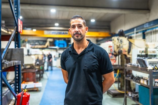 Portrait of a manual worker standing proud in the factory