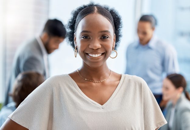 Business woman with smile at company office, leadership of teamwork and happy of planning for succe